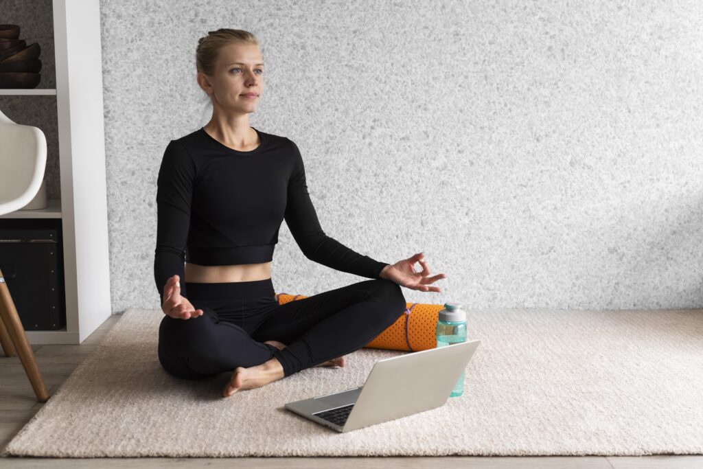 full-shot-woman-sitting-carpet